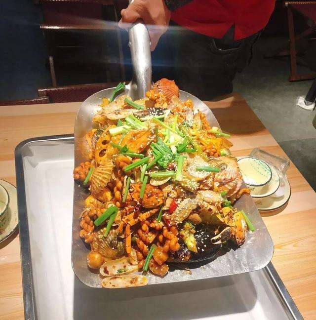 竞秀手抓海鲜加盟
